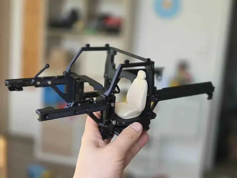 Bare chassis held in hand